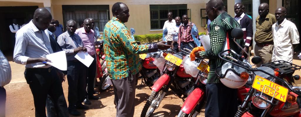 The RDC of Kaberamaido Mr. ONYA AKONAPESA EDWARD (c) Officiating at the Hand over of new motorcycles to Health workers of Kaberamaido and Kalaki Districts witnessed by the Vice District Chairperson Hon. Oboi Freddrick, CAO Mr. Ogwang Bernard and DHO Dr. Odongo at the District Head Quarters. Handover of Motorcycles